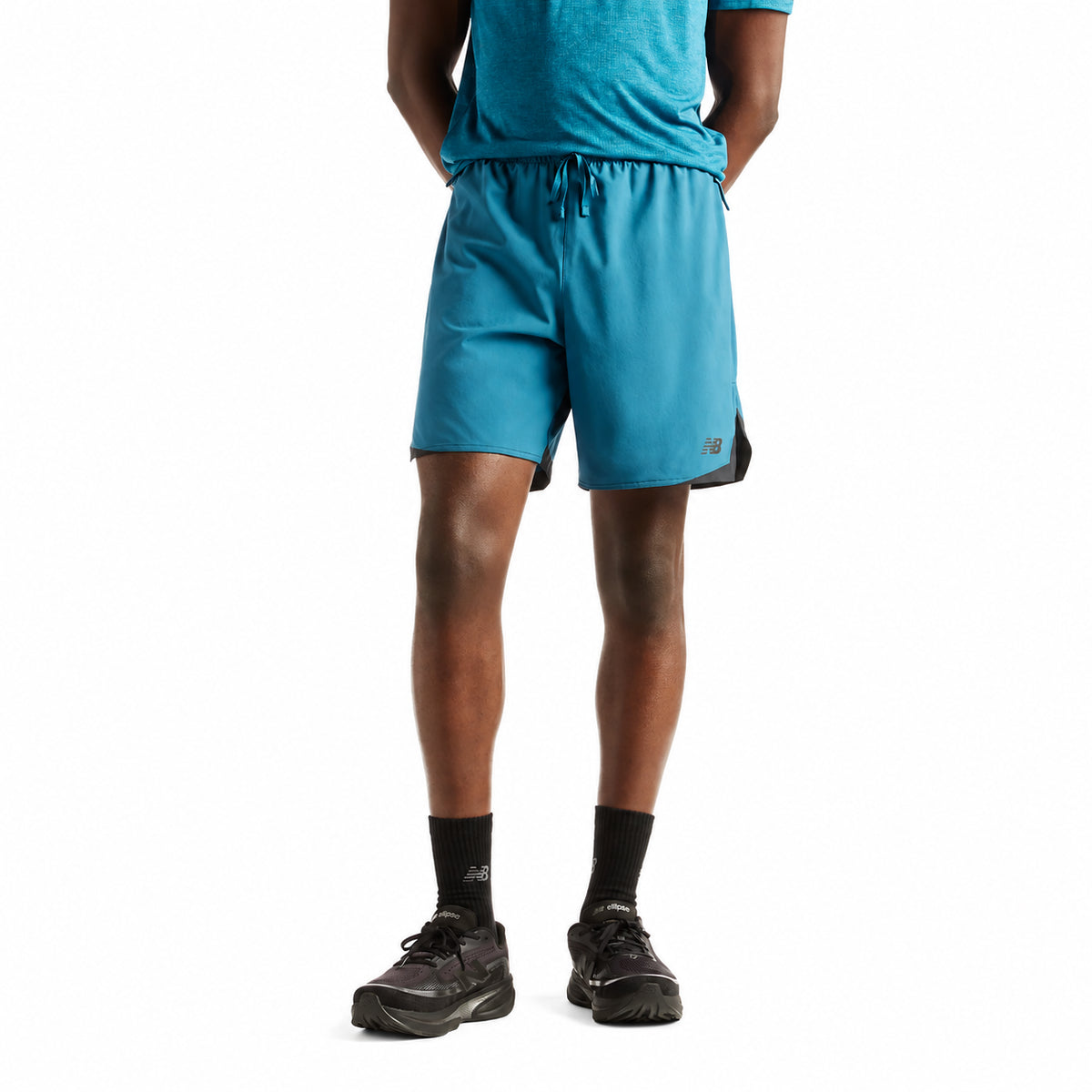 NEW BALANCE RC ESSENTIAL SHORT 7INCH - Turchese - immagine principale